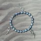 growth - iridescent pearl bracelet